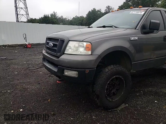 2004 Ford F-150 XL with VIN 1FTRF14W04NA37813, listed as a Copart auction lot 67119574 with Not Provided miles and Salvage Title. Bid and sale history available at DreamBid. Image 11.