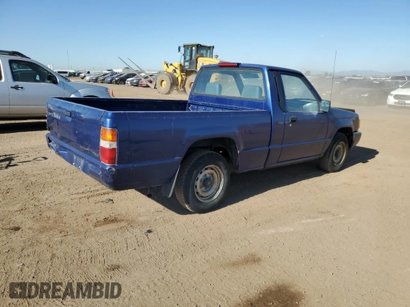 1994 Mitsubishi Mighty Max z VIN JA7LS21G4RP009588, wystawiony jako Copart lot #60519834 z przebiegiem 123 918 mil mil oraz Szkoda całkowita • Salvage title. Historia ofert i sprzedaży dostępna na DreamBid. Obrazek 3.