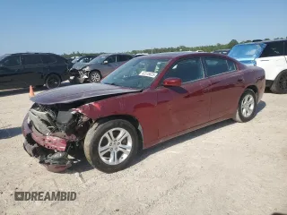 2021 Dodge Charger SXT with VIN 2C3CDXBG7MH624839, listed as a Copart auction lot 52515625 with 62,474 mi miles and Salvage Title. Bid and sale history available at carsss.com. Image 1.