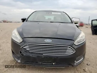 2018 Ford Focus Titanium z VIN 1FADP3N2XJL289659, wystawiony jako Copart lot #65594275 z przebiegiem 115 739 mil mil oraz Czysty tytuł • Clean title. Historia ofert i sprzedaży dostępna na DreamBid. Obrazek 5.