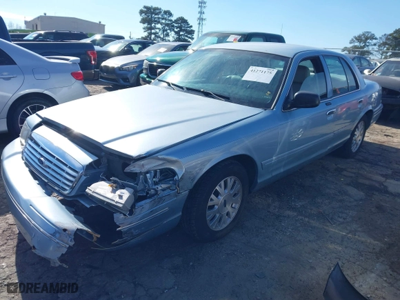 2005 Ford Crown Victoria LX with VIN 2FAFP74W65X135964, listed as a IAAI auction lot 41271175 with 82,494 mi miles. Bid and sale history available at carsss.com. Image 17.
