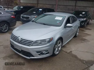 2014 Volkswagen CC Sport with VIN WVWBN7ANXEE501758, listed as a IAAI auction lot 41443518 with 193,259 mi miles and . Bid and sale history available at DreamBid. Image 2.