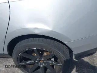 2013 Cadillac SRX z VIN 3GYFNAE32DS512534, wystawiony jako IAAI lot #41596602 z przebiegiem 193 131 mil mil oraz . Historia ofert i sprzedaży dostępna na DreamBid. Obrazek 12.