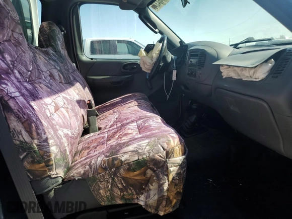 2004 Ford F-150 XL with VIN 2FTRF18W54CA36334, listed as a Copart auction lot 63464375 with 253,805 mi miles and Salvage title. Bid and sale history available at DreamBid. Image 10.