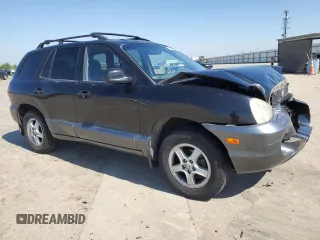 2001 Hyundai Santa Fe GLS with VIN KM8SC83D71U123474, listed as a Copart auction lot 50665145 with 84,155 mi miles and Salvage Title. Bid and sale history available at carsss.com. Image 4.