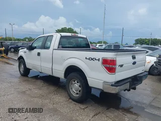 2014 Ford F-150 XL with VIN 1FTFX1EF2EKD41100, listed as a IAAI auction lot 42506812 with 153,255 mi miles and . Bid and sale history available at DreamBid. Image 3.