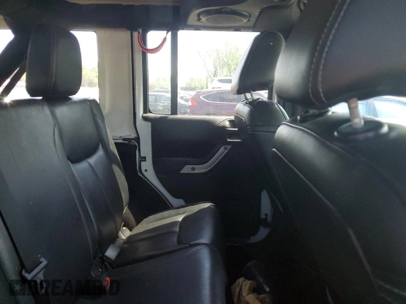 2013 Jeep Wrangler Unlimited Rubicon with VIN 1C4HJWFG2DL549064, listed as a Copart auction lot 56474055 with 148,217 mi miles and Salvage title. Bid and sale history available at DreamBid. Image 10.