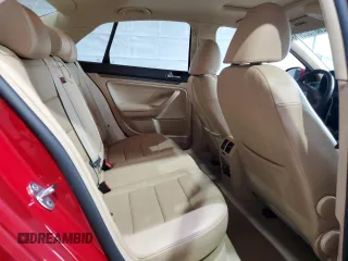 2009 Volkswagen Jetta SE z VIN 3VWRZ71K69M011873, wystawiony jako Copart lot #52881525 z przebiegiem 154 441 mil mil oraz Szkoda całkowita • Salvage title. Historia ofert i sprzedaży dostępna na DreamBid. Obrazek 10.