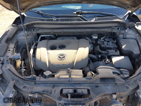 2019 Mazda CX-5 Touring with VIN JM3KFBCM7K0611896, listed as a IAAI auction lot 41732111 with 90,826 mi miles. Bid and sale history available at carsss.com. Image 10.
