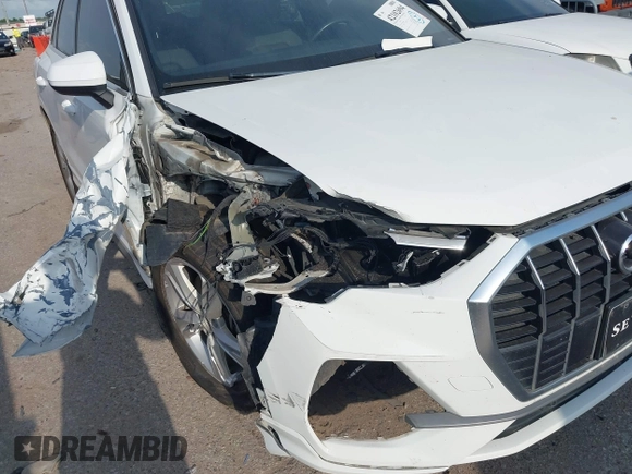 2022 Audi Q3 S line Premium z VIN WA1DECF34N1086088, wystawiony jako IAAI lot #42102694 z przebiegiem 81 530 mil mil oraz . Historia ofert i sprzedaży dostępna na DreamBid. Obrazek 6.