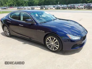 2015 Maserati Ghibli with VIN ZAM57XSAXF1141477, listed as a IAAI auction lot 42661798 with 61,995 mi miles and . Bid and sale history available at DreamBid. Image 1.