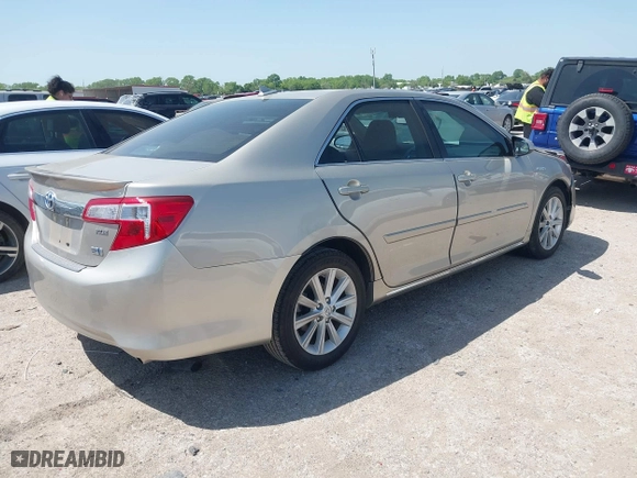 2013 Toyota Camry Hybrid LE with VIN 4T1BD1FK3DU092856, listed as a IAAI auction lot 42010493 with 27,497 mi miles. Bid and sale history available at carsss.com. Image 4.