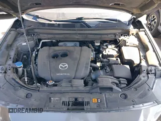 2020 Mazda CX-5 Grand Touring with VIN JM3KFADM3L1812649, listed as a IAAI auction lot 42575393 with 102,118 mi miles and . Bid and sale history available at DreamBid. Image 10.
