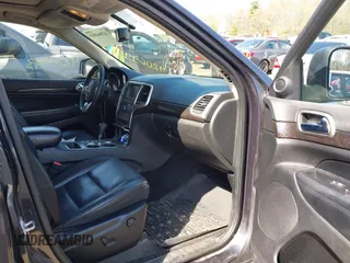 2013 Jeep Grand Cherokee Laredo with VIN 1C4RJFAG1DC592371, listed as a IAAI auction lot 42064993 with 136,154 mi miles. Bid and sale history available at carsss.com. Image 5.