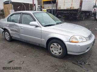 1997 Honda Civic EX with VIN 2HGEJ8643VH561244, listed as a IAAI auction lot 41810988 with 130,000 mi miles. Bid and sale history available at carsss.com. Image 1.