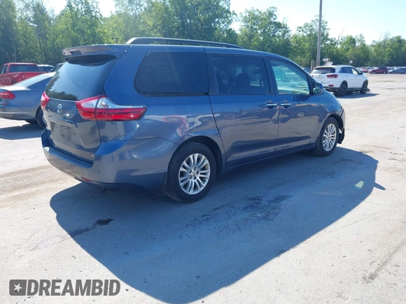 2015 Toyota Sienna XLE with VIN 5TDYK3DC8FS533898, listed as a IAAI auction lot 42630483 with 531,640 mi miles and . Bid and sale history available at DreamBid. Image 4.