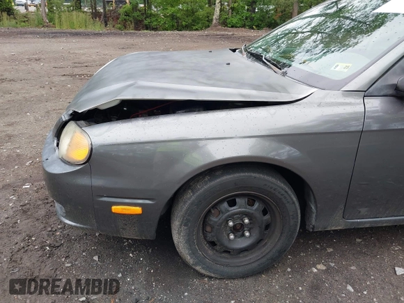 2002 Kia Spectra GS z VIN KNAFB161025058378, wystawiony jako IAAI lot #42222134 z przebiegiem 154 576 mil mil oraz . Historia ofert i sprzedaży dostępna na DreamBid. Obrazek 13.
