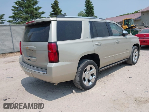 2015 Chevrolet Tahoe LTZ z VIN 1GNSKCKC0FR113647, wystawiony jako IAAI lot #42288089 z przebiegiem 113 322 mil mil oraz . Historia ofert i sprzedaży dostępna na DreamBid. Obrazek 4.