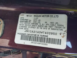 1998 Nissan Maxima GXE z VIN JN1CA21A0WT402950, wystawiony jako IAAI lot #41825084 z przebiegiem 244 042 mil mil oraz . Historia ofert i sprzedaży dostępna na DreamBid. Obrazek 9.