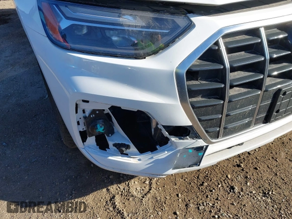 2022 Audi Q5 Premium Plus z VIN WA1BBAFY0N2078094, wystawiony jako IAAI lot #42061485 z przebiegiem 23 152 mil mil oraz . Historia ofert i sprzedaży dostępna na DreamBid. Obrazek 18.