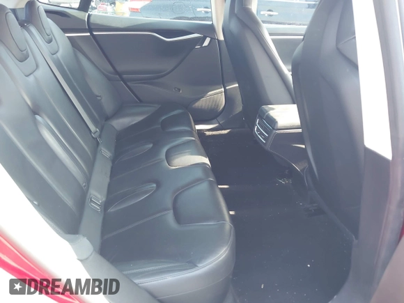 2014 Tesla Model S 60 z VIN 5YJSA1H16EFP42727, wystawiony jako IAAI lot #42544475 z przebiegiem 166 877 mil mil oraz . Historia ofert i sprzedaży dostępna na DreamBid. Obrazek 8.