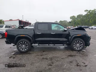 2024 GMC Canyon 4WD Denali with VIN 1GTP6FEK8R1133039, listed as a IAAI auction lot 41398204 with 7,735 mi miles and . Bid and sale history available at carsss.com. Image 13.