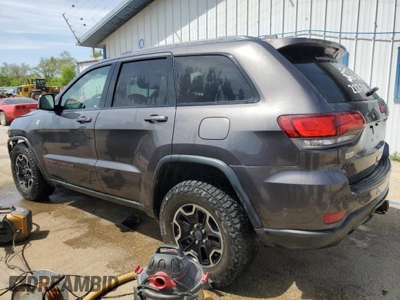 2017 Jeep Grand Cherokee Trailhawk with VIN 1C4RJFLGXHC654112, listed as a Copart auction lot 56397195 with 168,136 mi miles and Salvage title. Bid and sale history available at DreamBid. Image 2.