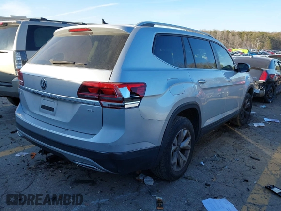 2018 Volkswagen Atlas SE with VIN 1V2CP2CA6JC595850, listed as a IAAI auction lot 41344485 with 86,469 mi miles and . Bid and sale history available at DreamBid. Image 4.