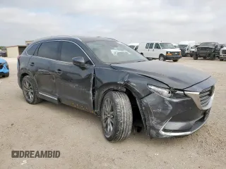 2018 Mazda CX-9 Signature with VIN JM3TCBEY3J0212172, listed as a Copart auction lot 57100485 with 95,353 mi miles and Salvage title. Bid and sale history available at DreamBid. Image 4.