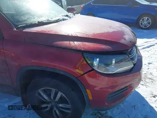 2013 Volkswagen Tiguan S with VIN WVGAV3AX2DW063067, listed as a IAAI auction lot 41638749 with 150,115 mi miles and . Bid and sale history available at DreamBid. Image 14.