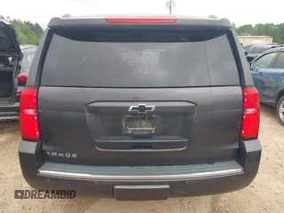 2016 Chevrolet Tahoe LTZ z VIN 1GNSKCKC3GR112445, wystawiony jako IAAI lot #42312996 z przebiegiem 107 511 mil mil oraz . Historia ofert i sprzedaży dostępna na DreamBid. Obrazek 16.