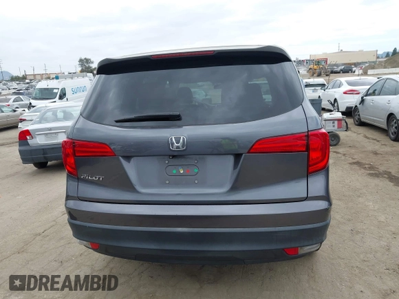 2016 Honda Pilot LX with VIN 5FNYF5H14GB037205, listed as a IAAI auction lot 42034018 with 101,943 mi miles and . Bid and sale history available at DreamBid. Image 16.