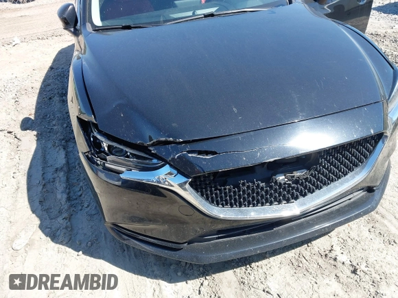 2020 Mazda 6 Sport with VIN JM1GL1UM7L1526598, listed as a IAAI auction lot 41888418 with 97,568 mi miles and . Bid and sale history available at DreamBid. Image 6.