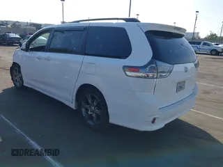2015 Toyota Sienna SE with VIN 5TDXK3DC6FS627578, listed as a IAAI auction lot 41568684 with 124,138 mi miles and . Bid and sale history available at DreamBid. Image 3.