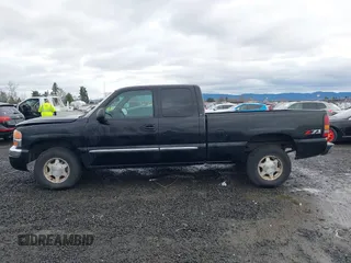 2004 GMC Sierra 1500 SLT with VIN 1GTEK19T74E400259, listed as a IAAI auction lot 41091044 with 173,726 mi miles. Bid and sale history available at carsss.com. Image 14.