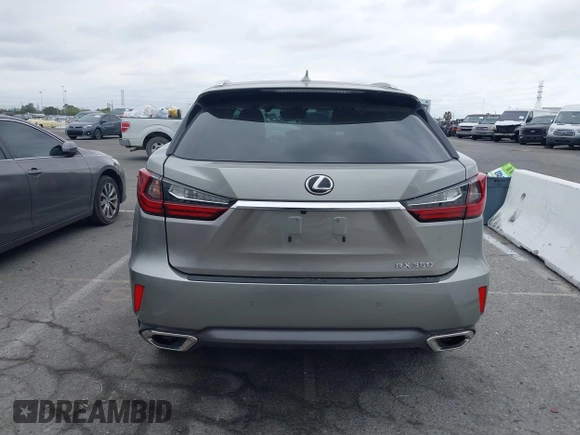 2018 Lexus RX 350 with VIN 2T2ZZMCA2JC098105, listed as a IAAI auction lot 42200869 with 52,323 mi miles and . Bid and sale history available at DreamBid. Image 16.