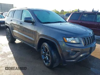 2015 Jeep Grand Cherokee Laredo with VIN 1C4RJFAGXFC631123, listed as a IAAI auction lot 41859251 with 201,558 mi miles. Bid and sale history available at carsss.com. Image 1.