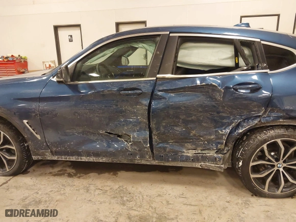 2023 BMW X4 xDrive30i with VIN 5UX33DT01P9R31277, listed as a IAAI auction lot 41618617 with 23,952 mi miles. Bid and sale history available at carsss.com. Image 14.