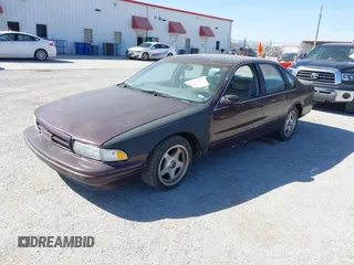 1996 Chevrolet Caprice Classic 1SA Special Value Pkg with VIN 1G1BL52P9TR184810, listed as a IAAI auction lot 41831242 with 1 mi miles. Bid and sale history available at carsss.com. Image 2.