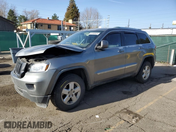 2011 Jeep Grand Cherokee Laredo with VIN 1J4RR4GG5BC578257, listed as a Copart auction lot 52393825 with 244,554 mi miles and Salvage Title. Bid and sale history available at carsss.com. Image 1.