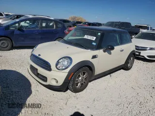 2013 MINI Hardtop with VIN WMWSU3C56DT682857, listed as a Copart auction lot 77677234 with 92,625 mi miles and Clean Title. Bid and sale history available at DreamBid. Image 1.