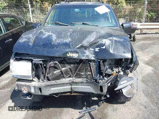 1997 Jeep Grand Cherokee Limited with VIN 1J4GZ78Y1VC658515, listed as a IAAI auction lot 41897266 with 164,033 mi miles and . Bid and sale history available at DreamBid. Image 6.