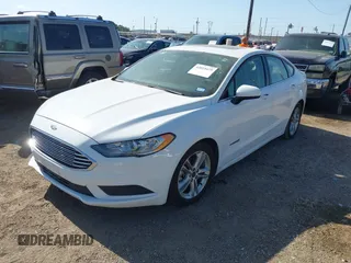 2018 Ford Fusion SE z VIN 3FA6P0LU2JR155483, wystawiony jako IAAI lot #42019475 z przebiegiem Nie podano mil oraz . Historia ofert i sprzedaży dostępna na DreamBid. Obrazek 2.