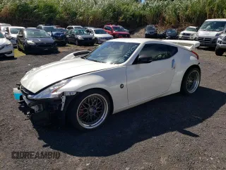 2014 Nissan 370Z Nismo with VIN JN1AZ4EH2EM630833, listed as a Copart auction lot 81773274 with 38,051 mi miles and Salvage Title. Bid and sale history available at DreamBid. Image 1.