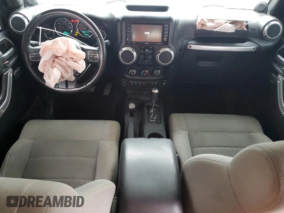 2014 Jeep Wrangler Unlimited Rubicon X with VIN 1C4HJWFG0EL142071, listed as a Copart auction lot 56187575 with 110,597 mi miles and Salvage title. Bid and sale history available at DreamBid. Image 8.