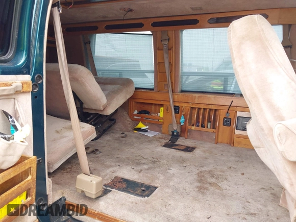 1994 GMC Vandura z VIN 1GDEG25K2RF523677, wystawiony jako IAAI lot #42500077 z przebiegiem 184 965 mil mil oraz . Historia ofert i sprzedaży dostępna na DreamBid. Obrazek 8.