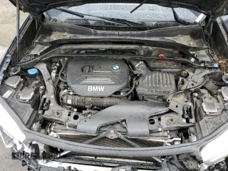 2016 BMW X1 xDrive28i with VIN WBXHT3C31G5E55041, listed as a Copart auction lot 48928705 with 104,799 mi miles and Salvage Title. Bid and sale history available at carsss.com. Image 14.