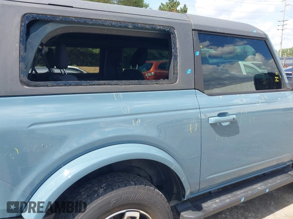 2022 Ford Bronco with VIN 1FMDE5AH3NLA89231, listed as a IAAI auction lot 42399132 with 13,244 mi miles and . Bid and sale history available at DreamBid. Image 6.