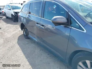 2016 Honda Odyssey SE with VIN 5FNRL5H3XGB043251, listed as a IAAI auction lot 42050805 with 156,537 mi miles. Bid and sale history available at carsss.com. Image 6.