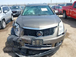 2016 Cadillac SRX Performance Collection z VIN 3GYFNCE39GS512286, wystawiony jako IAAI lot #42392467 z przebiegiem 95 708 mil mil oraz . Historia ofert i sprzedaży dostępna na DreamBid. Obrazek 12.